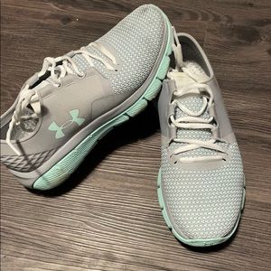 Grey and teal Under Armour shoes